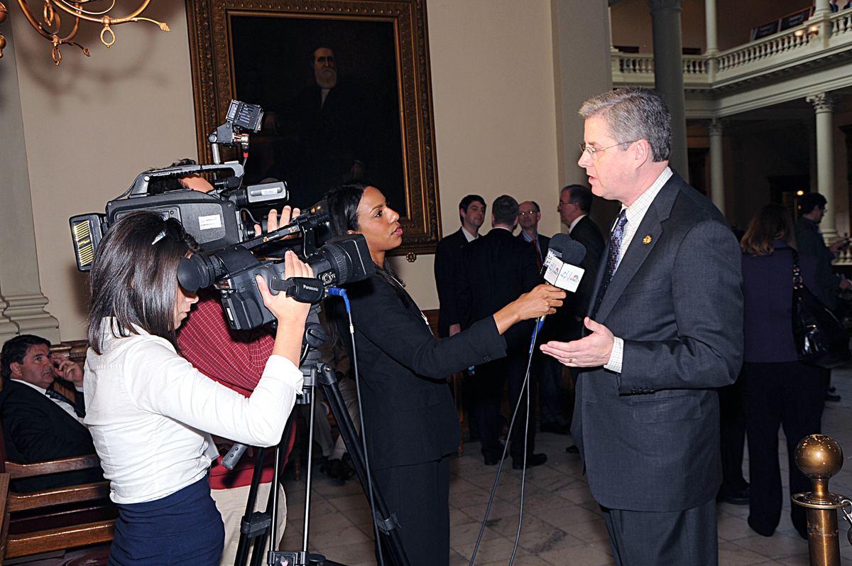 Dr. Cecil P. Staton giving a television interview in the Georgia State Capitol